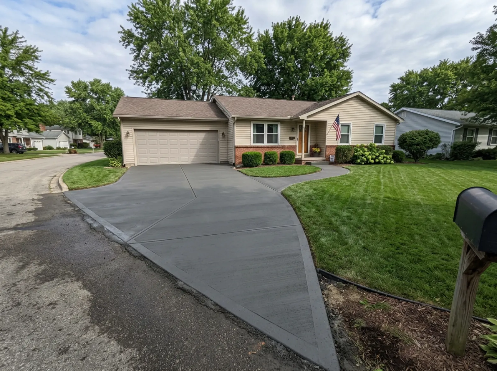 Freshly finished concrete driveway and walkway