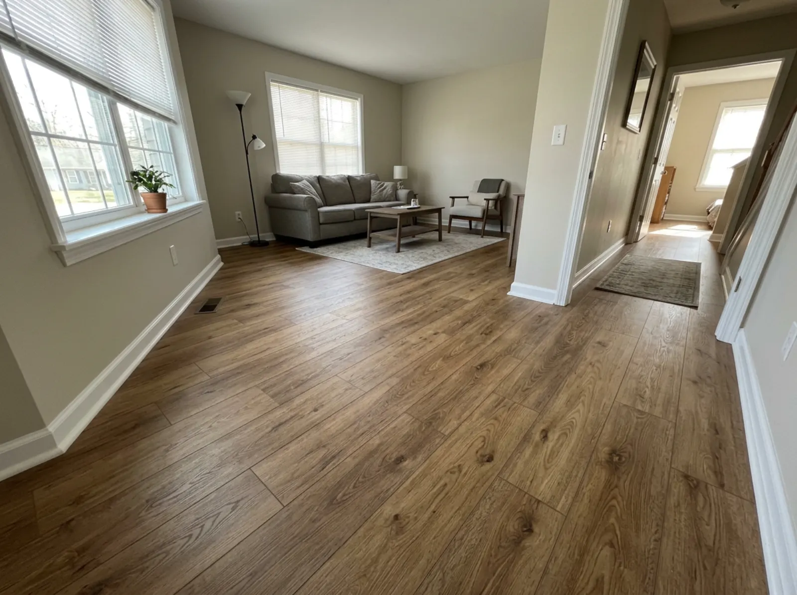 New plank flooring installed in a living room